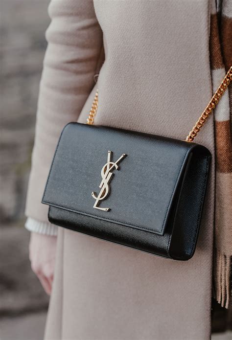 ysl clutch weiss|ysl clutch with chain.